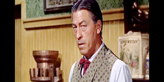 Regis Parton as Charlie, one of Nona Williams' bartenders, aligned with Mayor Yates in Johnny Reno (1966)