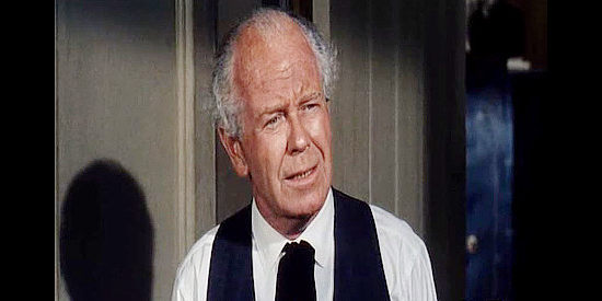 Regis Toomey as Cotton Benson, the banker who helps Jim Cole out in The Night of the Grizzly (1966)