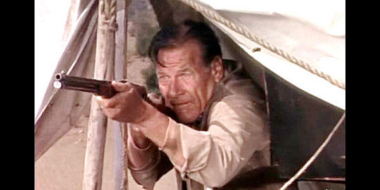 Richard Arlen as Sam Tyler, armed with a new rifle and trying to fend off an Indian attack in Fort Utah (1967)