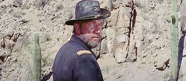 Richard Boone as Capt. Maddocks, finding his missing troop of cavalry in A Thunder of Drums (1961)