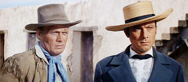 Richard Widmark as Sam Bowie and Laurence Harvey as Travis wait for the others to decide to leave or fight in The Alamo (1960)