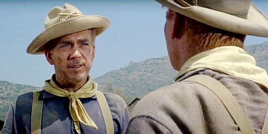 Robert Brubaker as Sgt. Walker, in a disagreement with Cpl. Bodine in 40 Guns to Apache Pass (1967)