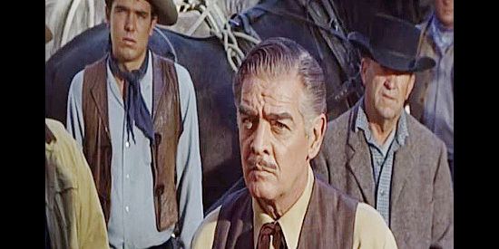 Robert Lowery as Jake Reed, a store owner conspiring with Mayor Jess Yates in Johnny Reno (1966)
