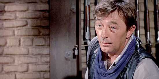 Robert Mitchum as Ben Kane, putting a young woman in her place in Young Billy Young (1969)