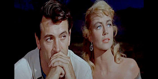 Rock Hudson as Dana Stribling and Dorothy Malone as Belle Breckenridge, getting closer and watching Missy and O'Mally do the same in The Last Sunset (1961)