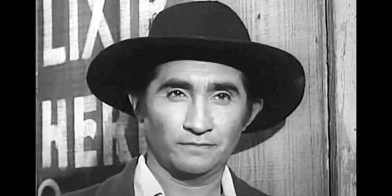Rodolfo Acosta as Sheriff Marguelez, responsible for keeping peace in the town where Linc Bartlett lives in Walk Like a Dragon (1960)