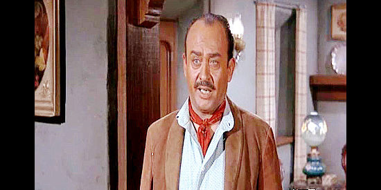 Rodolfo Hoyos Jr. as Miguel, reporting to Blaine Madden on what's happened while he's been away from Sanctuary in The Gun Hawk (1963)