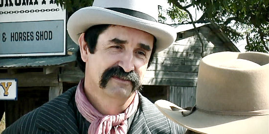 Ron E. Harris as Mortimer, suggesting he and Eryn grow closer to save her daddy's land from foreclosure in Hell's Fury (2009)