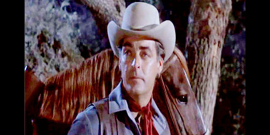 Rory Calhoun as Blaine Madden, admitting to avenging his father's death in The Gun Hawk (1963)