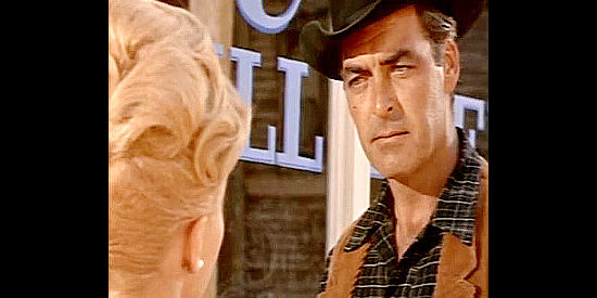 Rory Calhoun as Santee, wanting to know the whereabouts of his lady love in Black Spurs (1965)