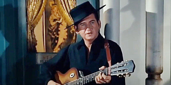 Roy Orbison as Johnny, a Southern spy, sings 'Pistolero' in The Fastest Guitar Alive (1967)