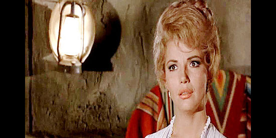 Ruta Lee as Marleen, the woman who wants to love Blaine Madden if he'll only let her in The Gun Hawk (1963)