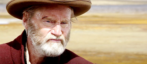 Sam Shepard as James Blackthorn, confronting an unexpected problem in Blackthorn (2011)
