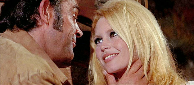 Sean Connery as Shalako and Brigitte Bardot as Irina Lazaar, getting closer in Shalako (1968)