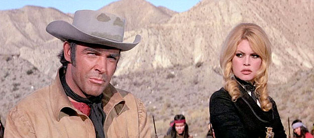 Sean Connery as Shalako and Brigitte Bardot as Irina Lazaar, surrounded by Apache warriors in Shalako (1968)