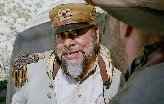 Sergio Calderon as Gen. Navarro, the Mexican general Bucklin is in cahoots with in Hard Ground (2003)