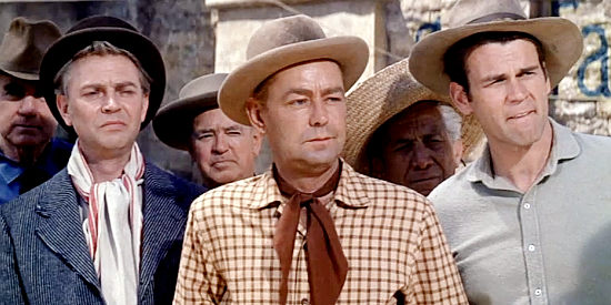 Sir Harry Ives (Don O'Herlihy), Mitch (Alan Ladd) and Dan (Don Murray) gather for to watch a fast gun contest in One Foot in Hell (1960)