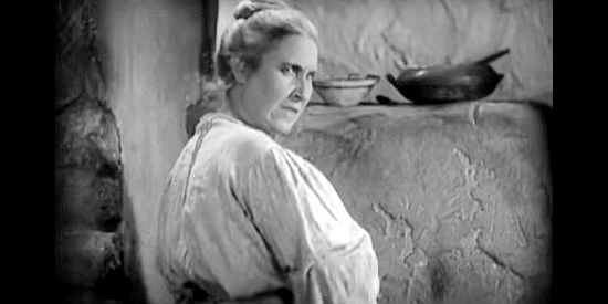 Soledad Jimenez as the cook, eavesdropping on Tonia Maria's gold-digging ways In Old Arizona (1928)