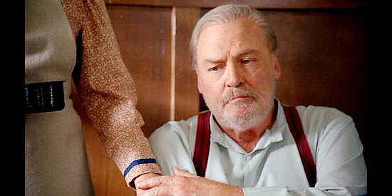 Stacy Keach as Robert Hattaway, Bobby's dad, being squeezed out of business by Stu Croaker in Lone Rider (2008)
