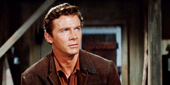 Steve Forrest as Clint Burton, caught in the middle of an Indian war because his father married a Kiowa woman in Flaming Star (1960)