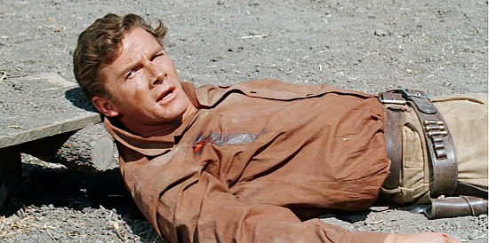 Steve Forrest as Clint Burton, wounded during a scrape with Kiowa warriors in Flaming Star (1960)