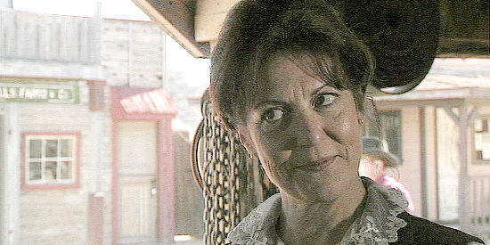 Susan Arnold as Mary Watson, wife of the retiring banker in The Decoy (2006)