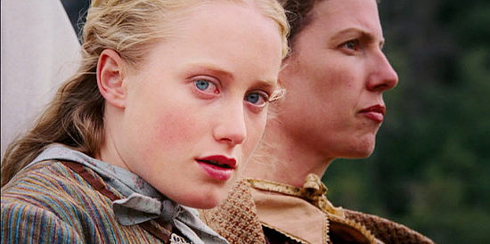 Tamara Hope as Emily, spotting Jonathan Samuelson for the first time in September Dawn (2006)