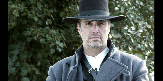 Ted Monte as Frank Phillips, the man with the task of ending the feud in Hatfields and McCoys, Bad Blood (2012)