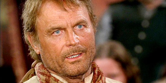 Terence Hill as Doc West, butting heads with Garvey for the first time in Doc West (2009)