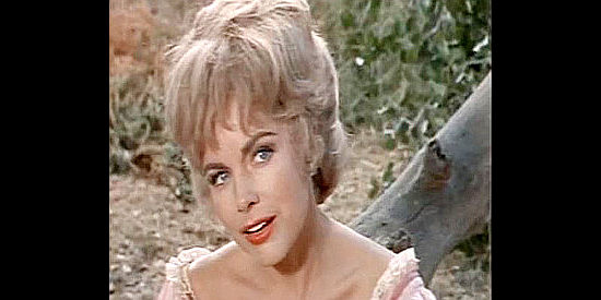 Terry Moore as Anna, about to receive an engagement ring from Santee in Black Spurs (1965)