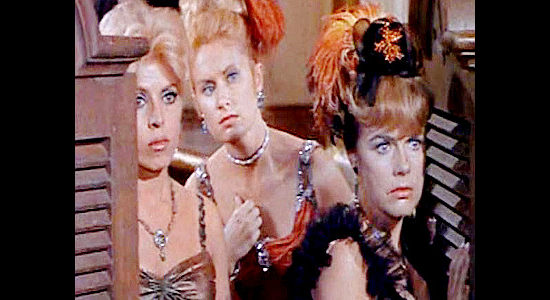 Terry Moore as Dolly, fretting with fellow saloon girls over the gunplay on the streets of Emporia in Waco (1966)