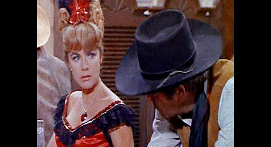 Terry Moore as Dolly, the saloon girl who takes a liking to Waco in Waco (1966)