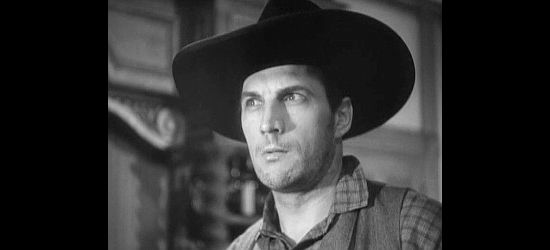 Tom Tyler as Luke Plummer, the man the Ringo Kid is looking for in Stagecoach (1939)
