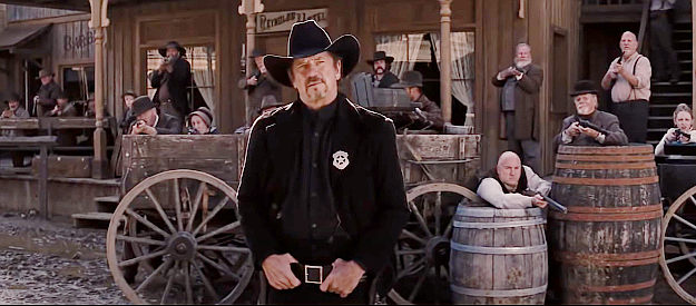 Tom Wopat as U.S. Marshal Gill Tatum, confronting Dr. Schultz about a bounty he just claimed in Django Unchained (2012)