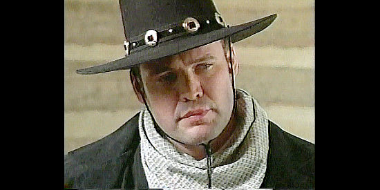 Tony Twist as Nathan Cross, a gunman and father of Tommy and Will in Defiance (2002)