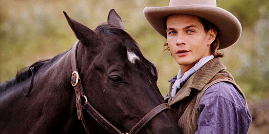 Trent Ford as Jonathan Samuelson, helping calm a difficult horse in September Dawn (2006)