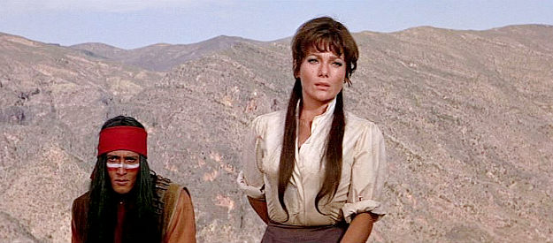 Valerie French as Elena Clarke, the senator's wife, watching hand-to-hand combat in Shalako (1968)