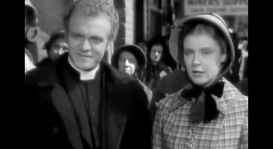 Van Heflin as The Rev. Samuel Woods and Jean Muir as Helen Colby, arriving in town in The Outcasts of Poker Flat (1937)