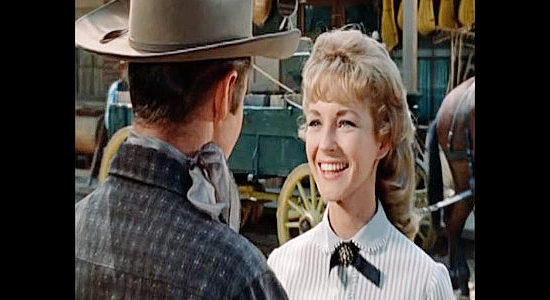 Venetia Stevenson as Joy Karrington, bidding Seven goodbye as he sets out after Jim Flood in Seven Ways from Sundown (1960)