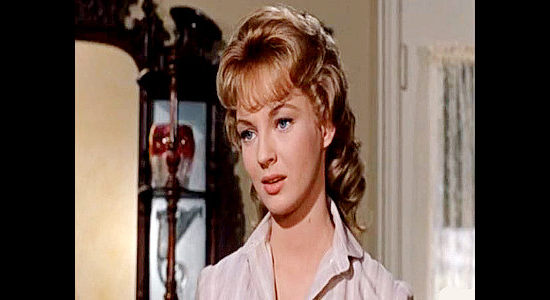 Venetia Stevenson as Joy Karrington, fretting over Seven, a young Texas Ranger she just met in Seven Ways from Sundown (1960)