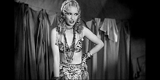 Vera Marshe as La Bella Rose, Windy's star dancer, scolding him for cheating customers at roulette in Way Out West (1930)