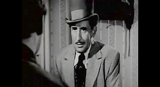 Victor Jory as Champ Clanton, a man with aspirations of becoming a railroad tycoon in Buckskin Frontier (1943)