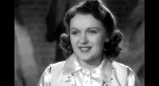 Virginia Dale as Okay Kinney, the Wild West show sharpshooter who falls for 'Wild Bill' in The Kid from Texas (1939)