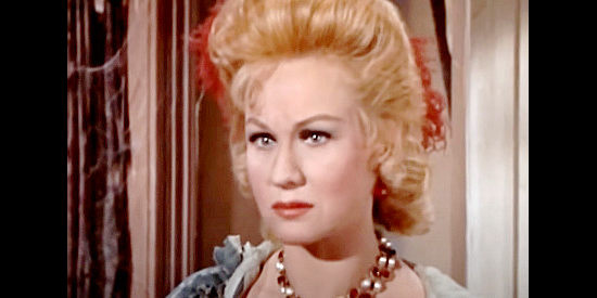 Virginia Mayo as Sara McCoy, who finds herself facing a reunion with an estranged husband and son in Young Fury (1965)