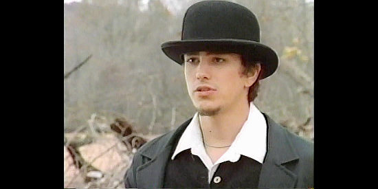 Walker Deibel as Tommy Cross, ready to gun down yet another man in Defiance (2002)