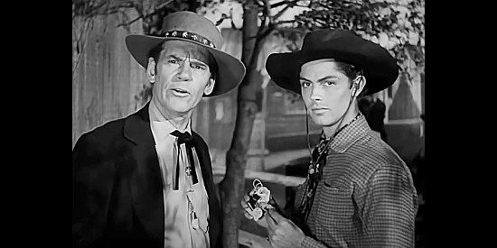Walter Huston as Doc Holliday with Jack Buetel as Billy the Kid in The Outlaw (1943)