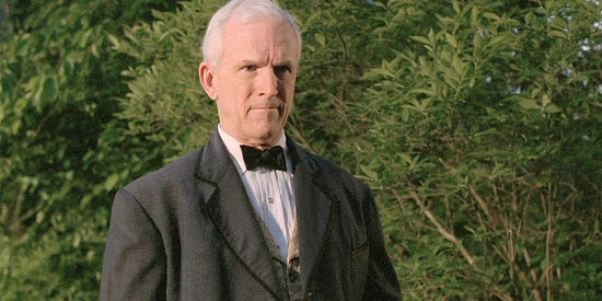 Weston Adams as Grandfather Adams, visiting a Civil War era grave in The Last Confederate (2005)