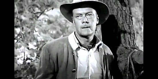 Willard Parker as Cole Younger, losing his patience with hot-headed Jesse in Young Jesse James (1960)
