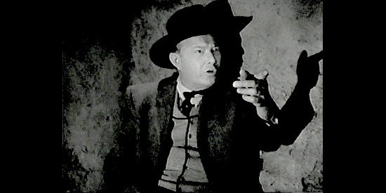 Willard Robertson as Luke Packard, a bank agent looking for a stolen $40,000 in Along Came Jones (1945)