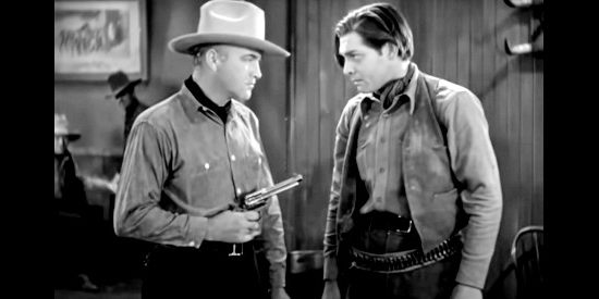 William Boyd as Bill Holbrook, squaring off with Rance Brett (Clark Gable) in The Painted Desert (1931)